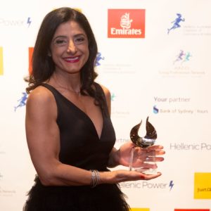 Suzi Dafnis with HACCI award for Women of Influence