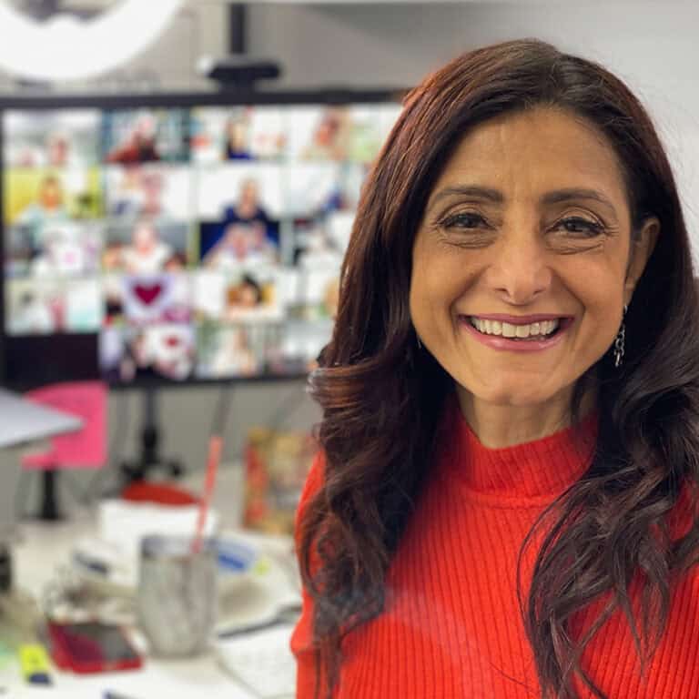 Woman making the shift from solopreneur to entrepreneur by building a real business
