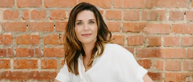 Woman entrepreneur evolving her business story as she steps into leadership